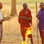 Enjoy sundowners with a the local Masaai warriors. 