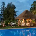 Destress and indulge in a treatment at the unique poolside Massage Gazebo.