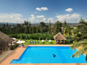 Sink into a comfortable sun lounger beside the pool with a refreshing cocktail in hand.