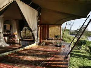 Your private nest is perched on the riverbank, with gorgeous views from its large veranda.