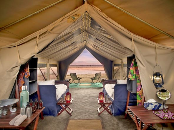 Curl up in your luxurious bed at Zambezi Expeditions, your tent is set along the river so you will have amazing views.