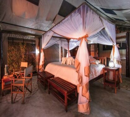 Large four poster beds in canvas tents create the perfect balance between African chic and top-class comfort and style.