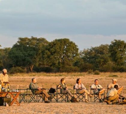 Sip on sundowner drinks in one of the oldest protected conservation areas in Zambia.
