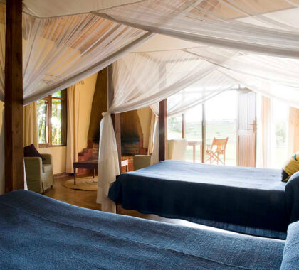 The beds at Ngorongoro Farm House are netted.