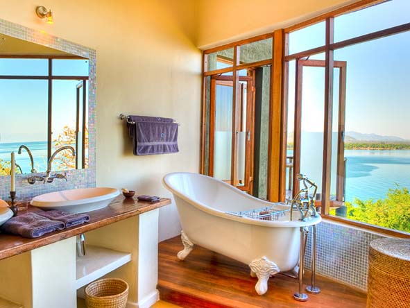 The bathrooms also offer splendid views and are well equipped with a bathtub, double shower and double sink.
