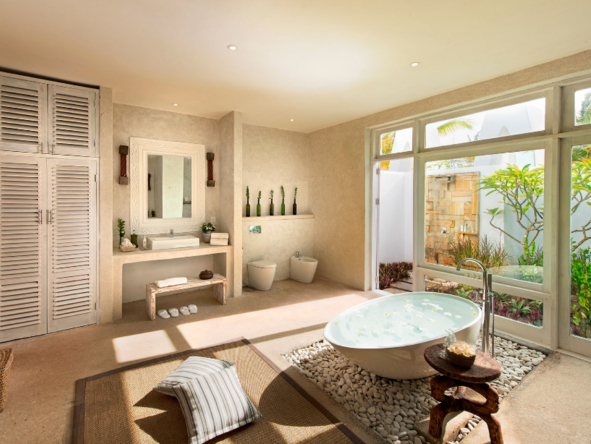 The Prestige Villa Beachfront room has a fully en suite bathroom .