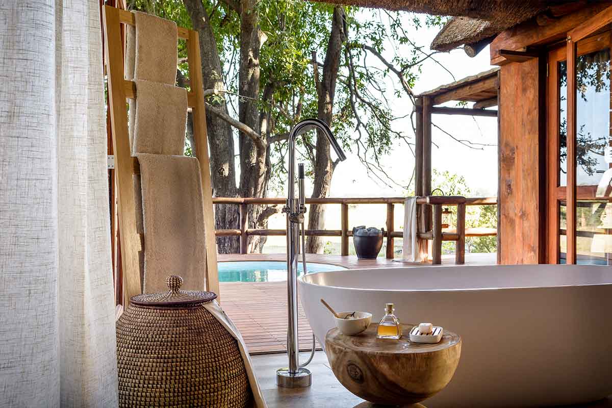 Luxurious bath and pool at Sanctuary Chief Camps, Botswana