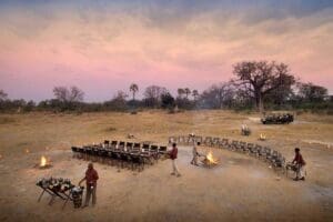Alfresco dining at Sandibe Okavango Safari Lodge, Botswana.