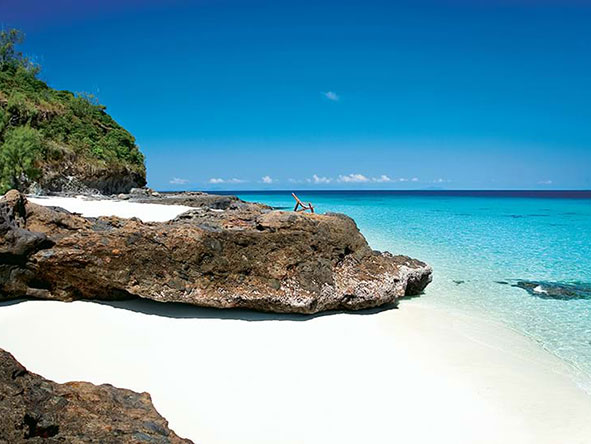 Explore Madagascar, with its rainforests, gem-blue clear seas and chalk-white beaches.