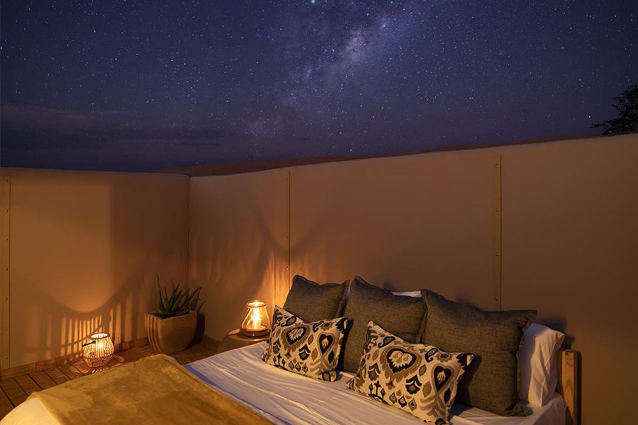 Kwessi Dunes star room at night in NamibRand Nature Reserve, Namibia.