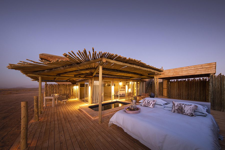 Little Kulala star bed on sleepout deck in Sossusvlei, Namib-Naukluft National Park. Namibia.