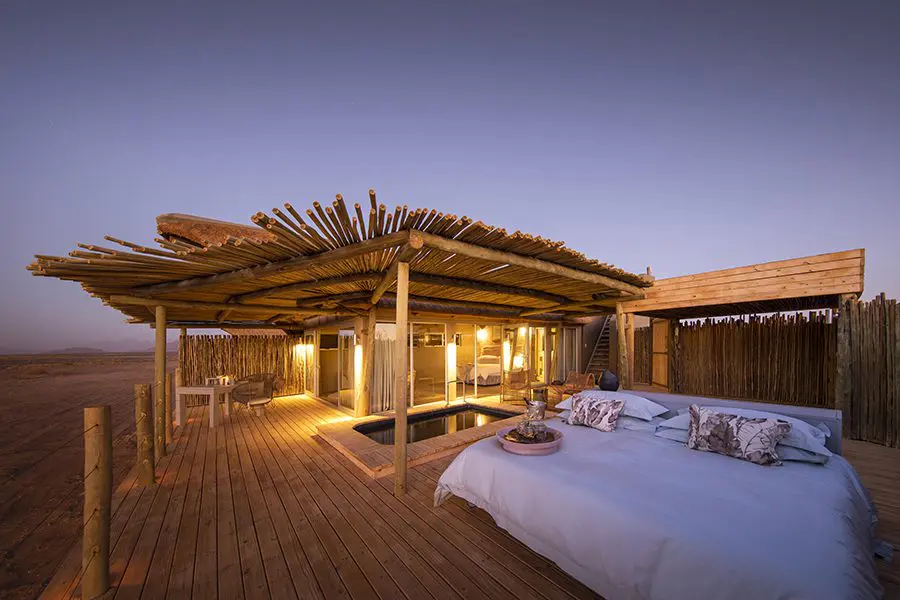 Little Kulala star bed on sleepout deck in Sossusvlei, Namib-Naukluft National Park. Namibia.