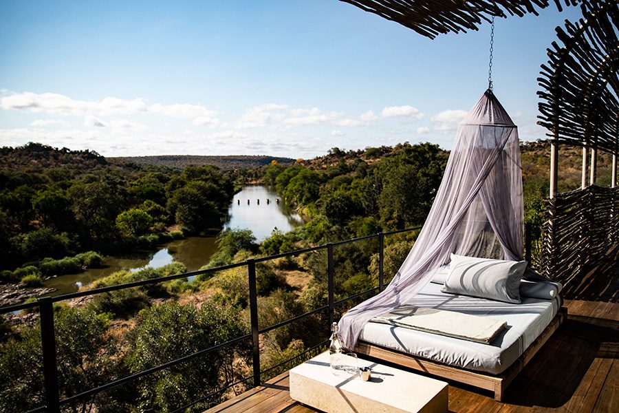 Singita Lebombo Lodge daybed in luxury suite in Kruger National Park, South Africa.
