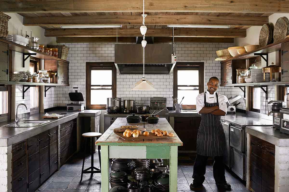 Chef standing in the private villa kitchen at Singita Castleton, Sabi Sand, South Africa