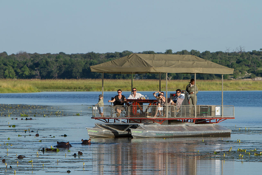 A family enjoying a boating safari. 