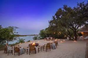 On the river beach, relax around the firepit. 