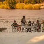 Sundowners on the river. 
