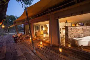 Guest tent exterior and bathroom view.