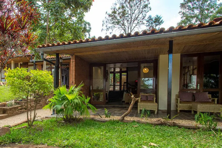 Tranquil setting in lush tropical gardens.