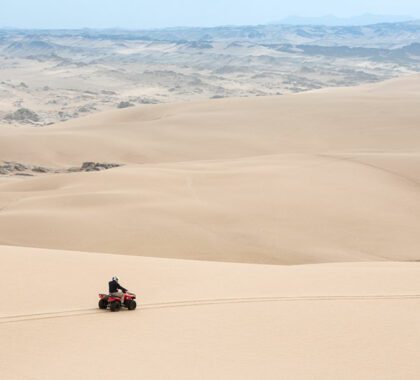 Quad biking on the sand dunes of Namibia.