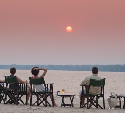 Enjoy spectacular views of the Zambezi River as the sun sets.