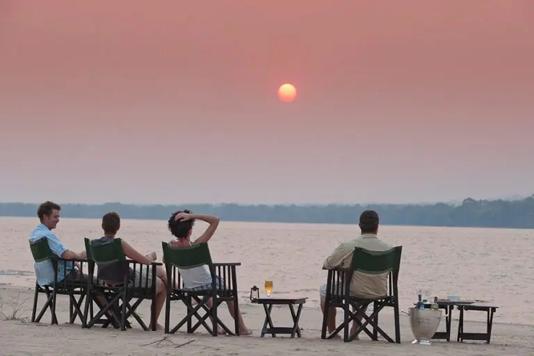 Enjoy spectacular views of the Zambezi River as the sun sets.