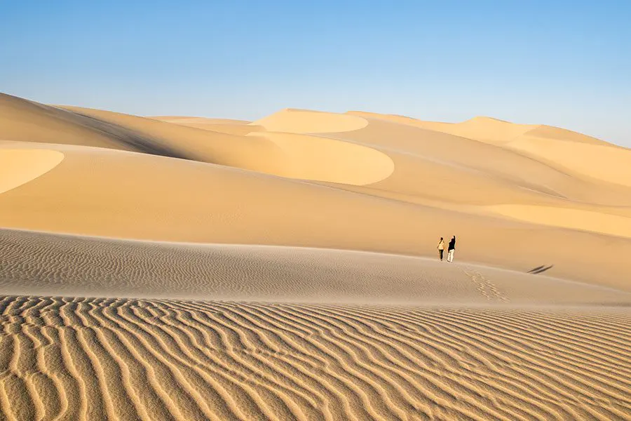 Explore the dunes of Namibia on foot.