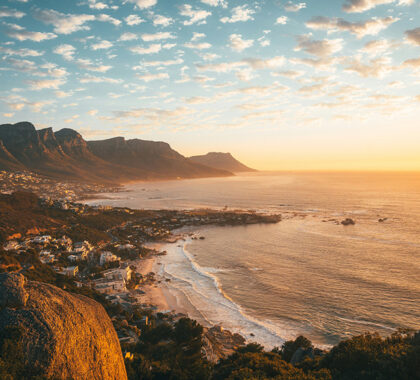 Cape Town mountains and ocean vistas at sunset.