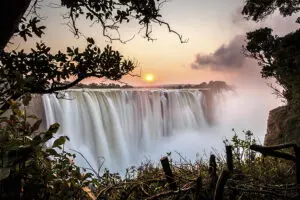 Visit iconic Victoria Falls.