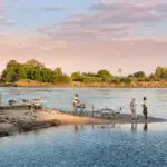 Cena a orillas del río