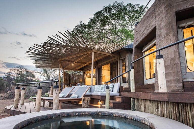 Suite exterior with a private pool.