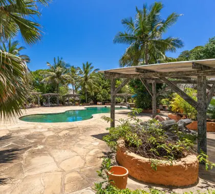 Relax in one of the pool cabanas.