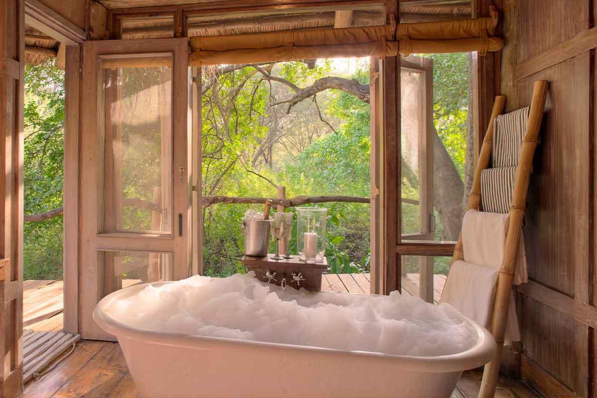 View from your bathroom at Lake Manyara Tree Lodge in Lake Manyara National Park, Tanzania.