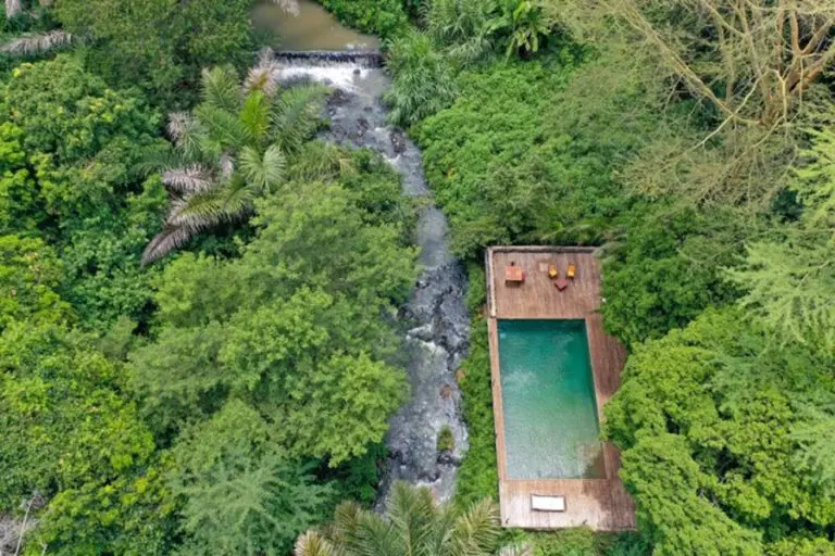 Aerial view of the Rhino River Camp swimming pool and river.