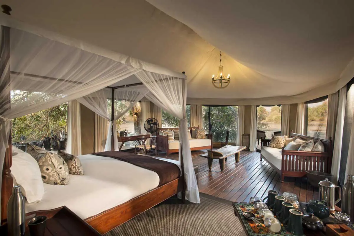 Meru-styled tents at Kanga Camp are elevated for a view over the Kanga Pan.