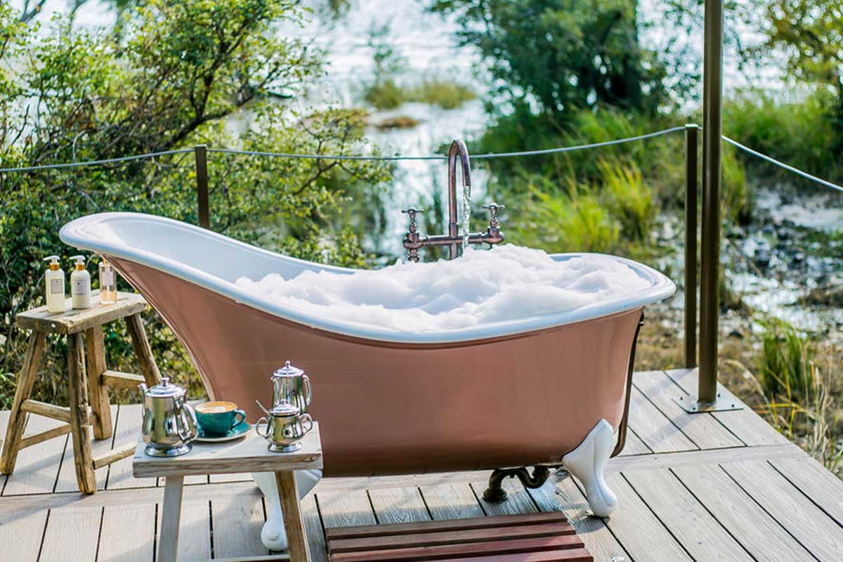 A bubble bath on the banks of the Zambezi River, at Old Drift Lodge.