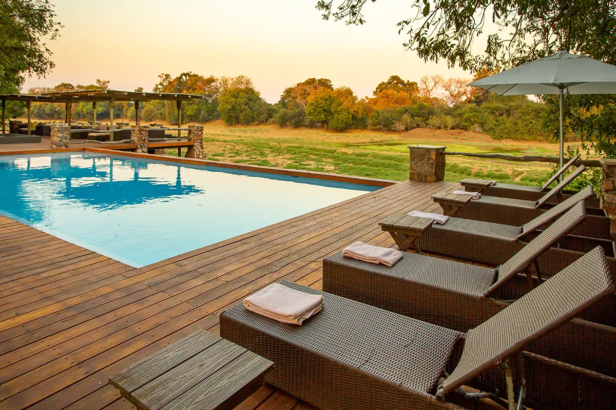 Mfuwe-THE-BUSHCAMP-COMPANY---Swimming-pool-&-deck-area