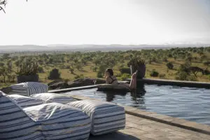 Catch some sun next to the swimming pool.