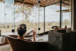 Soak in the bath, overlooking the reserve.