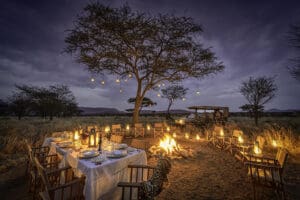 A lantern-lit boma dinner.