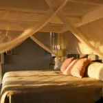 Cosy bedroom with mosquito.