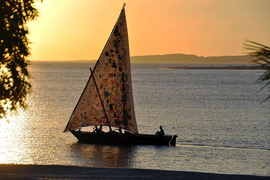 Dhow sailing at sunset.