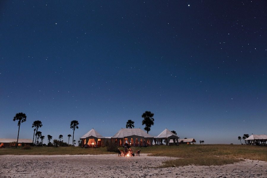 Fire pit under African skies at San Camp, Botswana | Go2Africa