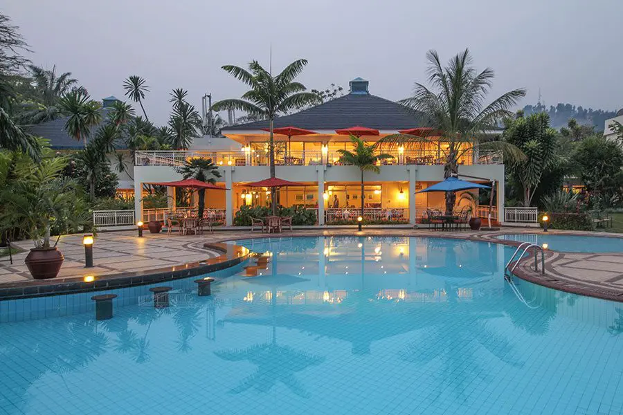 The Lake Kivu Serena Hotel swimming pool at sunset.