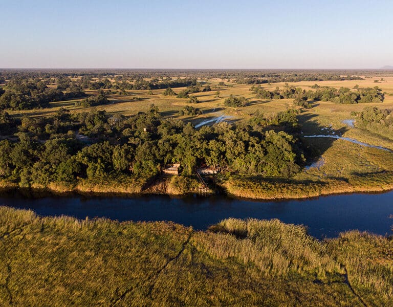 Nxamaseri Island Lodge is perched on the bank of a permanent water channel in the Okavango Delta.