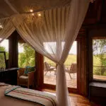 Guest room spacious interior with a private deck.