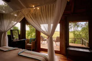 Guest room spacious interior with a private deck.