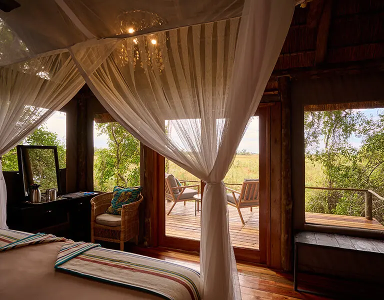 Guest room spacious interior with a private deck.