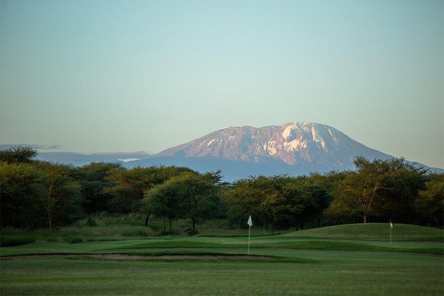 A golf course with Mount Kilimanjaro as its view in Arusha, Kenya.