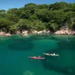 Kayaking on Lake Malawi at Mumbo Island Camp.